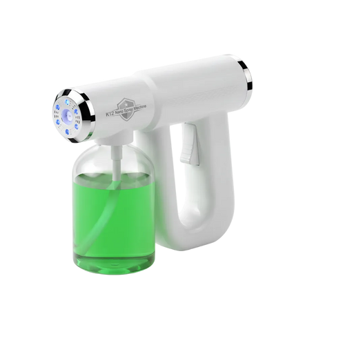 A handheld electric liquid dispenser with a white body, silver trim, and a clear bottle filled with bright green liquid, shown on a clean white background.